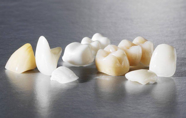 Пластмассовые коронки для зубов